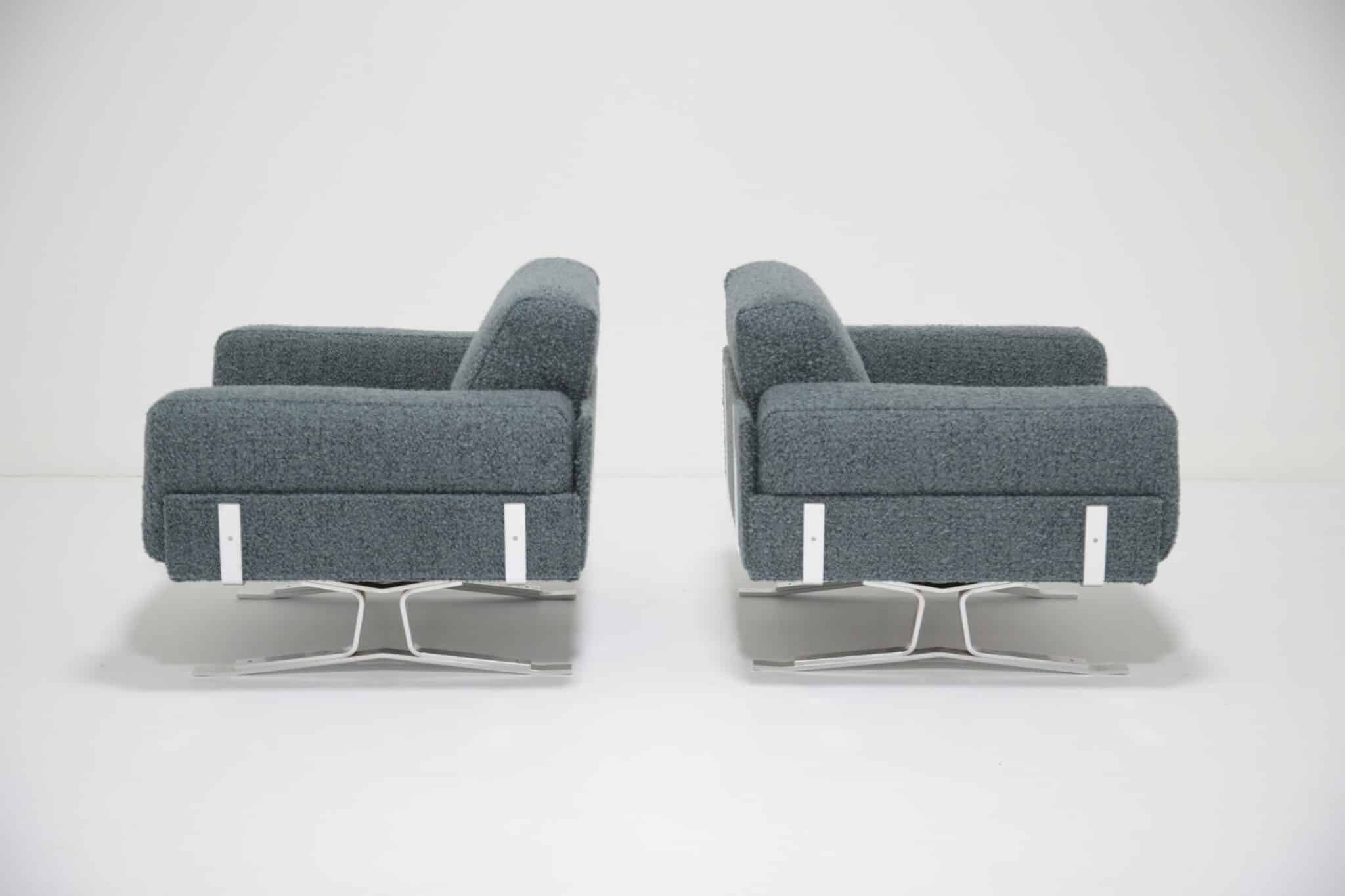 Pair of William Plunkett armchairs showing chairs side on.